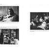 Black and white photograph from the Law of One series showing two individuals seated, possibly engaging in a conversation or presentation related to the material.