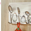 The Whimsical Wire by Schiffer Publishing, Ltd. is a decorative board featuring whimsical family figures made from beginner wire crafts and kitchen utensils, each with a spoon or fork head and book-page body, arranged as unique hooks.