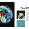 A vibrant Josh Simpson glass sculpture with coral-like patterns sits on a dark background. Beside it, a page labeled “3 PLANETS” from Schiffer Publishing, Ltd. shows text and hands gently holding this stunning glass art.