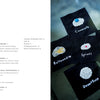 On the left, Juno's Nature Embroidery Notebook by Schiffer Publishing, Ltd. shows a contents page with embroidery instructions; on the right, five black squares feature embroidered gemstones on blue, inspired by nature patterns.
