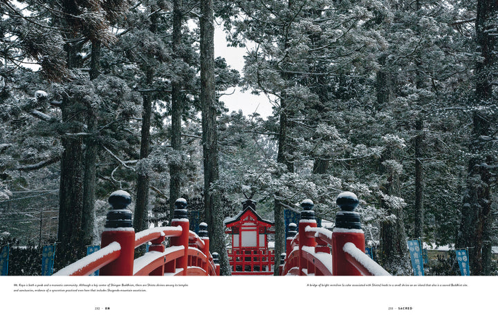 A snow-covered red arched bridge leads to a small shrine amid tall trees, featured in "Japan" by Schiffer Publishing, Ltd.—a perfect addition to any collection capturing serene, wintry beauty and Japanese culture.