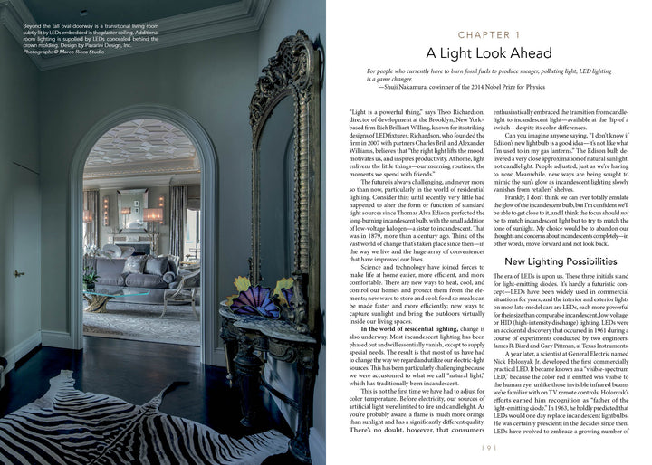 A stylish space with a zebra rug, black chest, and mirror leads to an elegant sitting room—ideal inspiration for residential lighting, as explored in "Lighting beyond Edison" from Schiffer Publishing, Ltd.