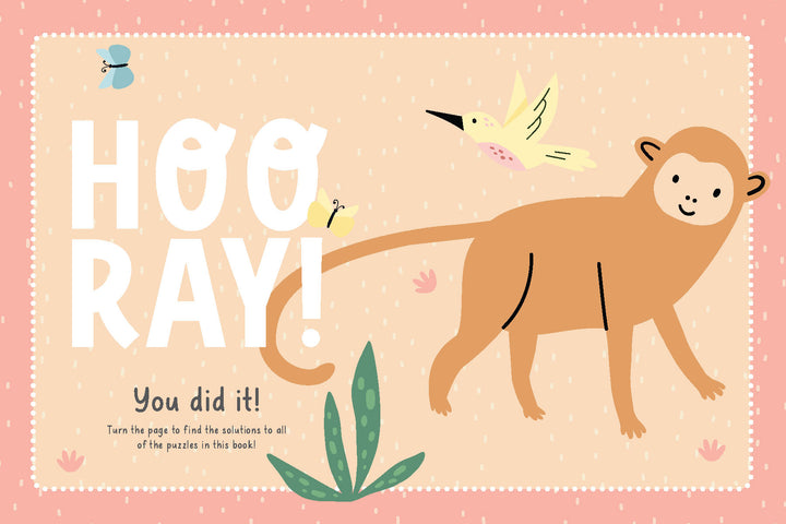 A cheerful illustration with "HOORAY!" in large letters, a smiling monkey, yellow hummingbird, butterfly, blue insect, and green leaves on pink—like positive messages in Schiffer Publishing's KindKids Word Search. Text reads: You did it!.
