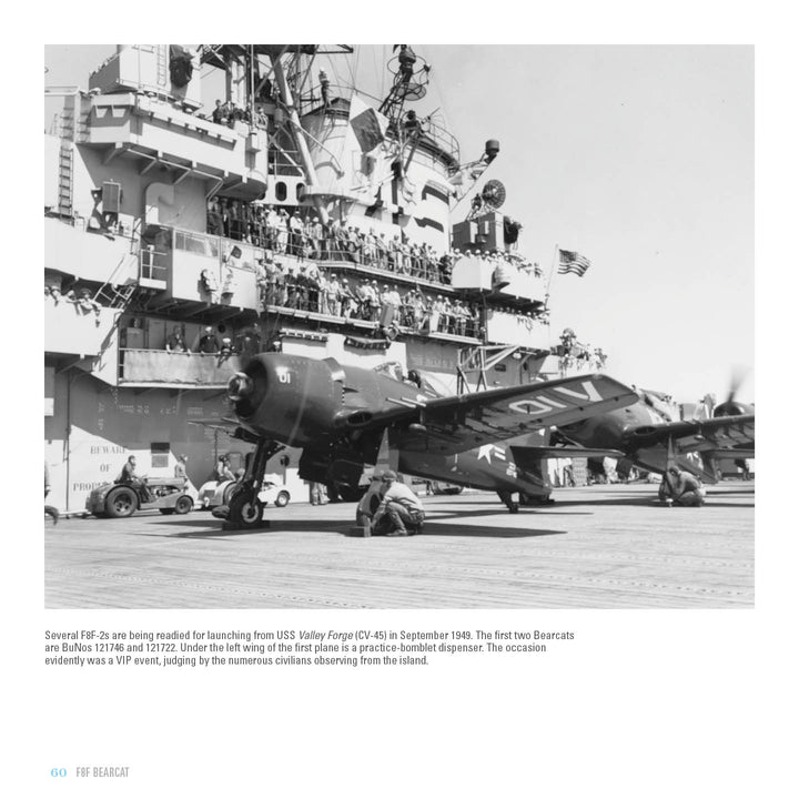 A black-and-white 1948 photo captures two F8F Bearcat planes on the USS Valley Forge’s deck, as sailors and civilians watch the carrier-borne fighters being prepared. From Schiffer Publishing, Ltd.